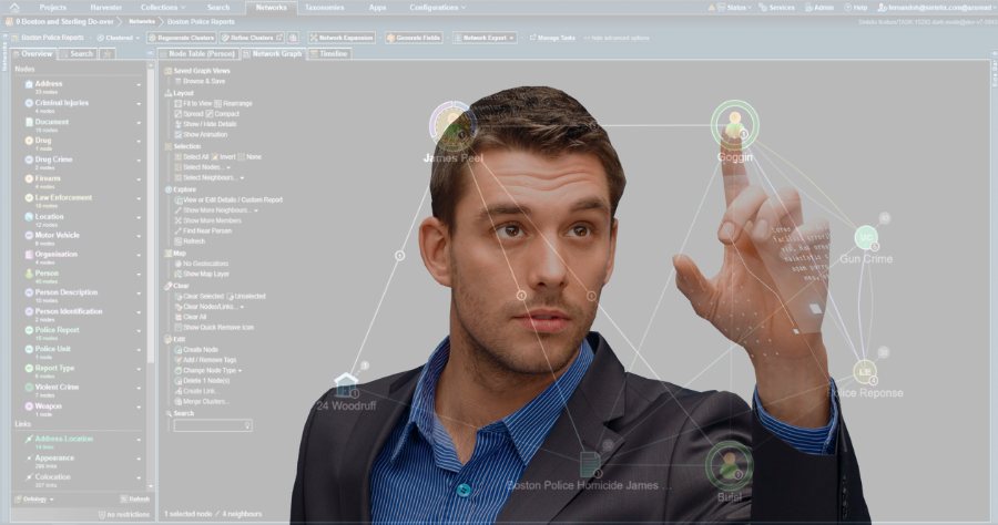 Analyst pointing to a person on a network chart